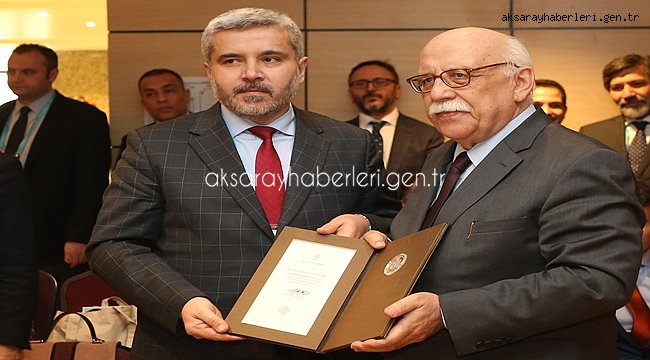 BAKAN AVCI’DAN REKTÖR ŞAHİN’E TEŞEKKÜR BERATI